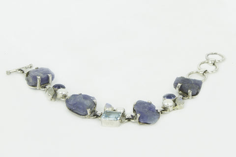 “ROUGH WATER” rough Tanzaniate and gems silver bracelet.