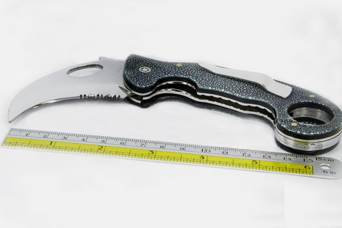“CAPTAIN HOOK” knife with stingray handle.