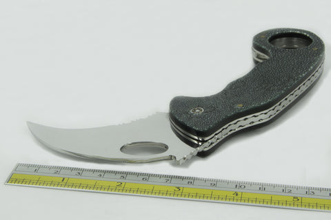 “CAPTAIN HOOK” knife with stingray handle.